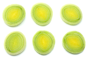 sliced leek isolated on white background top view
