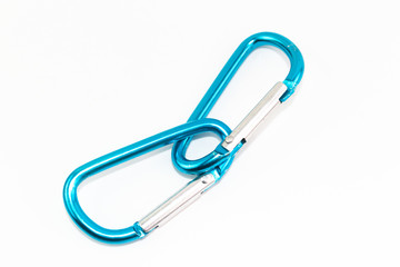 Blue aluminum safety hooks on white background