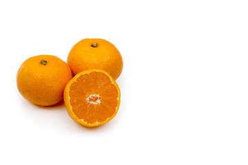 Oranges with leaf isolated on white.