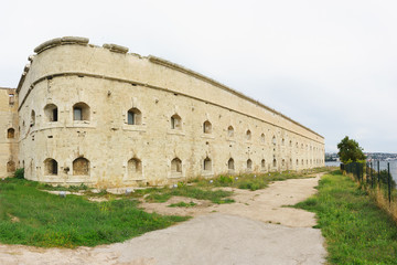 Fototapeta na wymiar Fortification on the coast of the city of Sevastopol to protect the naval dockyard from attack from the sea