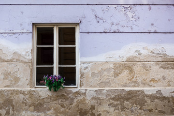 Fototapeta na wymiar Window at an old house