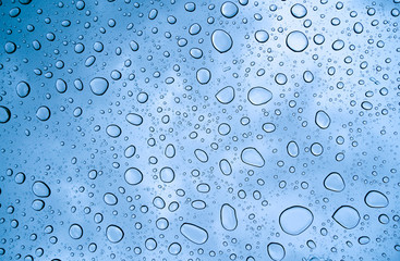 Background of beautiful water drops on glass