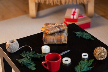 woman wrapping christmas presents