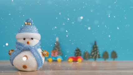 Happy snowman standing in winter christmas snow background. Merry christmas and happy new year greeting card with copy-space. Christmas celebration holiday background.