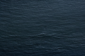 Dark grey black slate background or texture.