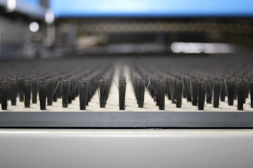 close up of cnc punching machine  in perspective