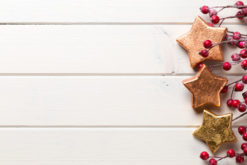 Christmas decor on the wooden white background.
