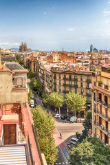Naklejka na ściany i meble Aerial view over the rooftops of central Barcelona, Catalonia, Spain