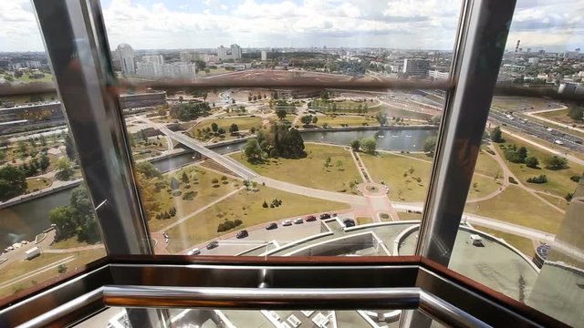 Glass elevator going down. Panoramic elevator at the National Library of Belarus, Minsk.