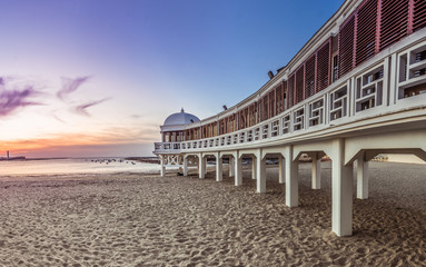 Cadiz beach during sunset. Impressive panoramic view along the old seaside resort. Spain / Andalusia - obrazy, fototapety, plakaty