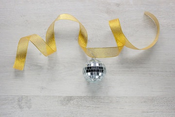 Golden ribbon with a little discoball