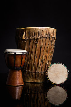 Three old handmade Djembe drums