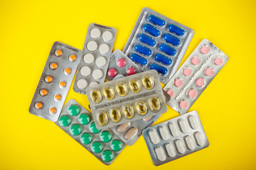 the group of color medical pills in packages