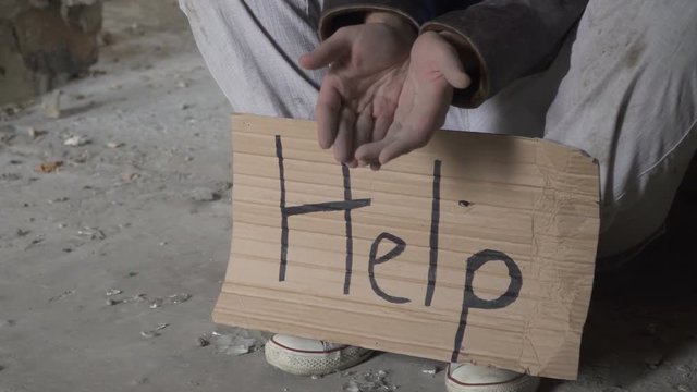 Poor homeless ask money and need help