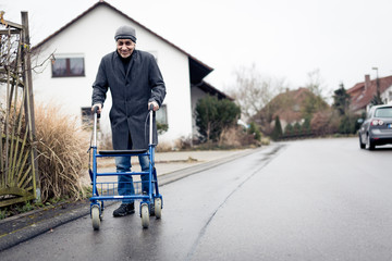 Senior Man With Walking Frame