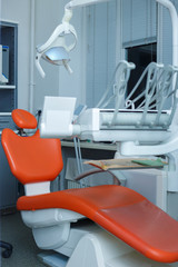 Modern dental practice. Dental chair and other accessories used by dentists in dental clinic
