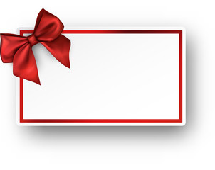 White holiday card with red bow.