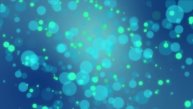 Blue green bokeh background with floating colorful light bubbles.