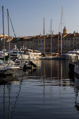 Boats and reflections in the St. Tropez, France marina
