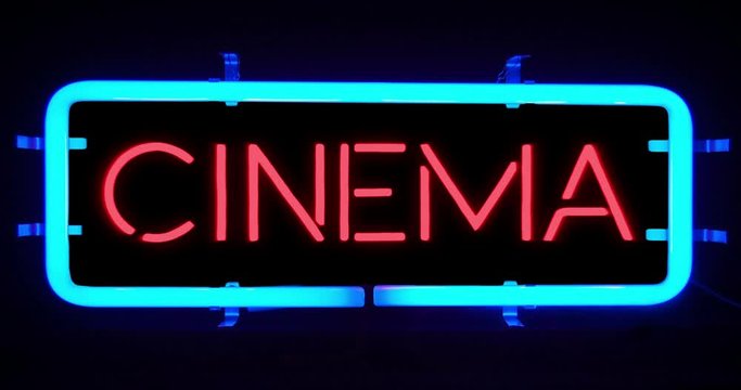 flickering blinking blue neon sign on black background, cinema movie film entertainment sign concept