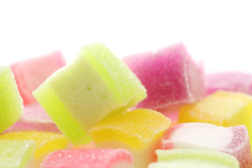 Colorful cube jelly candy isolated in white background