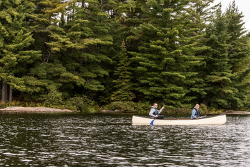 Canada Ontario Lake of two rivers Couple on a Canoe Canoes on the water Algonquin National Park
