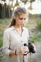 Young girl walking in the forest