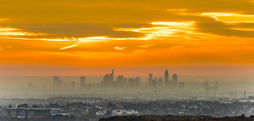 Fototapeta premium view to skyline of Frankfurt in sunrise