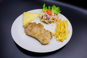 Ham steak on a plate
