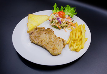 Ham steak on a plate