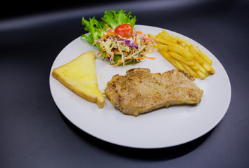 Ham steak on a plate