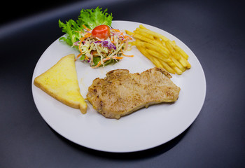 Ham steak on a plate