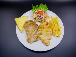 Ham steak on a plate