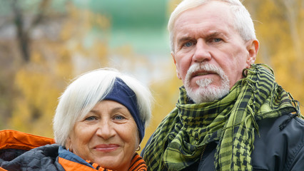 Cheerful positive elderly couple