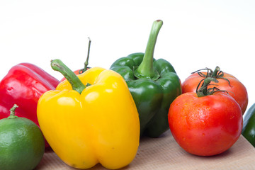 Fresh fruits and vegetables isolated on white background,Red green yellow vegetables,Fresh fruits and vegetables piled together on a white background,Close up vegetables and fruits