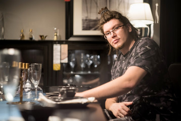 young caucasian man in the restaurant