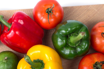 Fresh fruits and vegetables isolated on white background,Red green yellow vegetables,Fresh fruits and vegetables piled together on a white background,Close up vegetables and fruits
