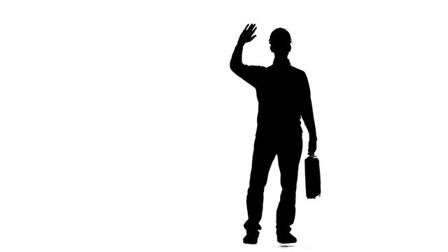 Builder with a diplomat in his hands waving his hand to people. Silhouette. White background