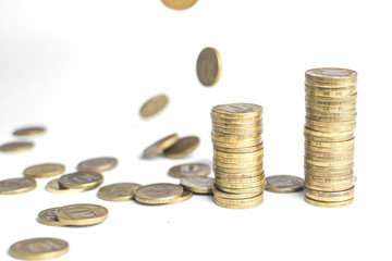 Coin stacks on white background different heights