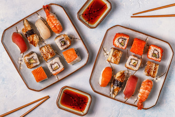 Sushi Set: sushi and sushi rolls on plate.