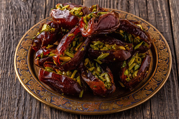 Dry dates stuffed with pistachios.