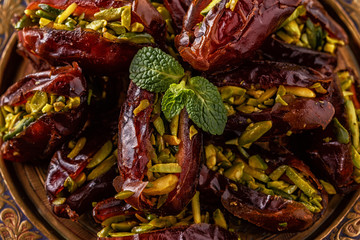 Dry dates stuffed with pistachios.