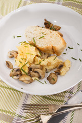 fine dining, scrambled eggs with mushroom, chive and bread