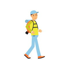 Young man tourist walking with hiking backpack on his shoulders. Outdoor recreation, summer vacation concept