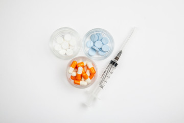 Medications and pills on a white background closeup shot