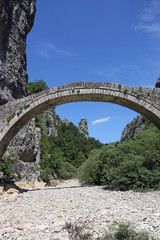 Fototapeta na wymiar Kokkori arched stone bridge landmark Zagoria Greece