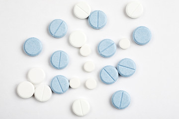 Medications and pills on a white background closeup shot