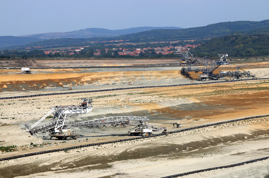 giant excavators digging on open pit coal mine Kostolac Serbia