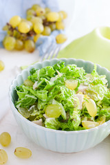 Salad with chicken and grapes, selective focus