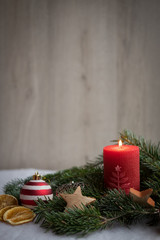 Christmas ornaments with snow, pine tree and candles
